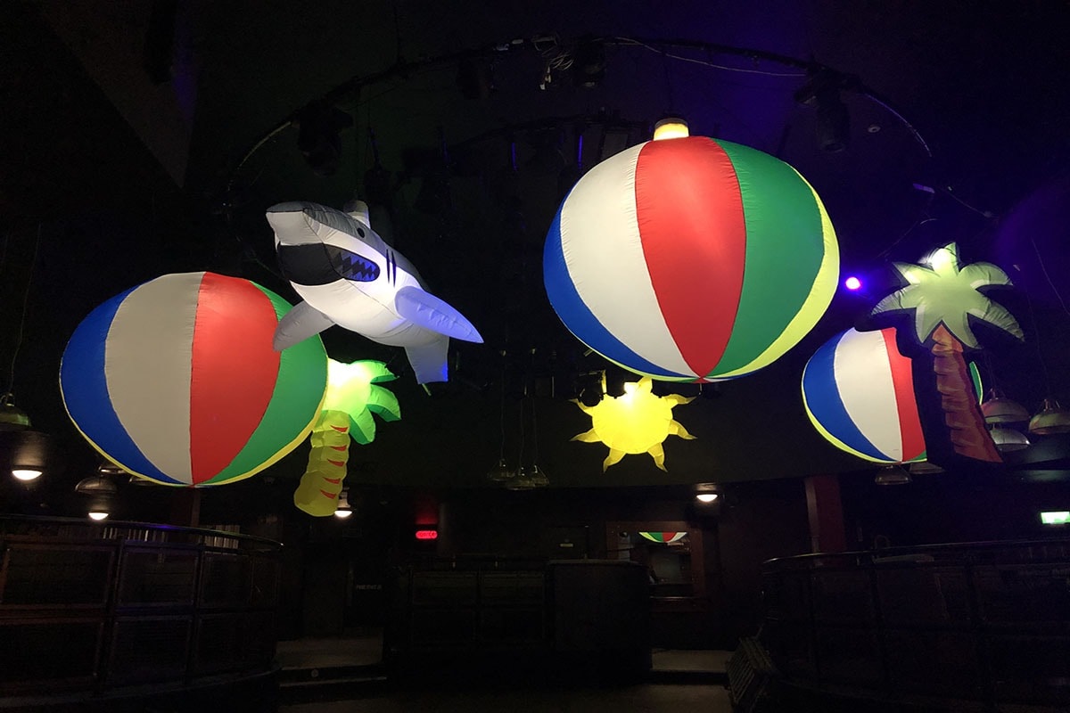 beach party, beach theme, summer party, themed event hire, themed event, large beach inflatables, hanging beach balls, hanging large shark, beach themed event, event hire, events hire, summer event hire.