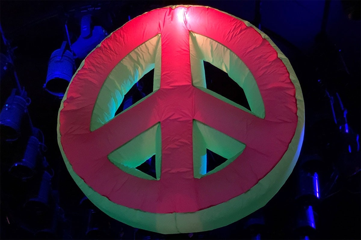 giant inflatable hire, inflatable peace sign, large inflatable peace, inflatable hire, giant inflatable hire, 60's themed event, flower power party, hippy theme hire, flower party, large flower hire, giant peace sign hire gloucestershire, inflatable hire gloucestershire, giant inflatable hire cheltenham, inflatable hire cheltenham, large inflatable hire, giant peace signs..
